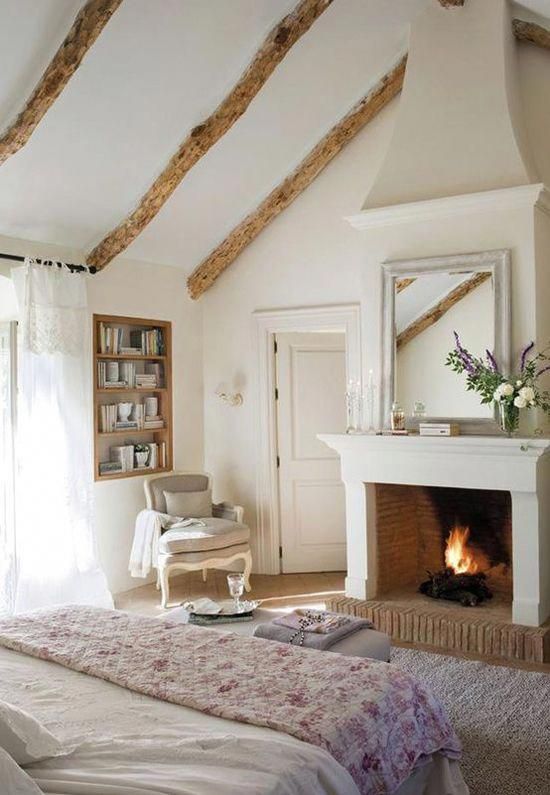 Farmhouse Bedroom With Fireplace