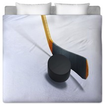 3d Illustration Of Hockey Stick And Floating Puck On The Ice Bedding 126911449