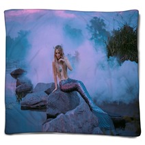 A Beautiful Mermaid Is Sitting On The Rock In The Purple Fog Blankets 217907479