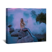 A Beautiful Mermaid Is Sitting On The Rock In The Purple Fog Wall Art 217907479