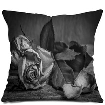 A Black And White Vintage Image Of A Rose On Wooden Table Pillows 59417810