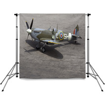 A British Spitfire Fighter Plane Stands Ready For Action Backdrops 3555587