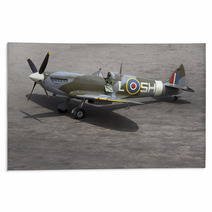 A British Spitfire Fighter Plane Stands Ready For Action Rugs 3555587