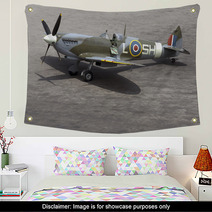 A British Spitfire Fighter Plane Stands Ready For Action Wall Art 3555587