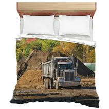 A Dump Truck About To Unload A Pile Of Dirt Bedding 36585640