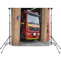A Fire Engine Leaving The Fire Station Backdrops 8652606