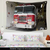 A Fire Truck Is Parked In The Bay At The Firehouse Wall Art 9582143