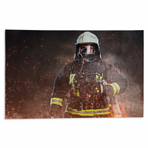 A Firefighter Dressed In A Uniform In A Studio Rugs 192482883