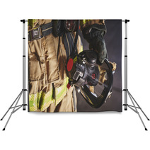 A Firefighter Holding An Oxygen Mask Backdrops 134425386