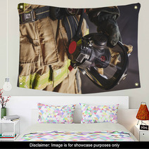 A Firefighter Holding An Oxygen Mask Wall Art 134425386