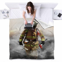 A Firefighter Pierces Through A Wall Of Smoke Blankets 62499189