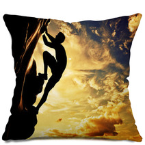 A Silhouette Of Man Climbing On Mountain At Sunset. Adrenaline Pillows 61621308