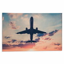 Airplane On Sunset Sky Jet Flying Airplane Rugs 170629954