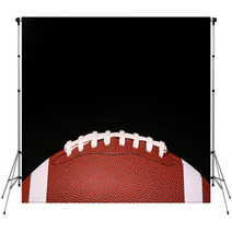 American Football Ball Over Black Background Backdrops 69964820