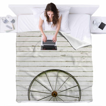 Antique Wooden Wagon Wheel On Rustic White Background Blankets 67006686