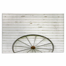 Antique Wooden Wagon Wheel On Rustic White Background Rugs 67006686