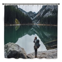 Backpacker Taking Picture Of Teal Lake Bath Decor 174363687
