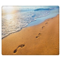 Beach Wave And Footprints At Sunset Time Rugs 112702409