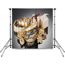 Beautiful Golden Jewelry And Gifts On Grey Background Backdrops 41622894