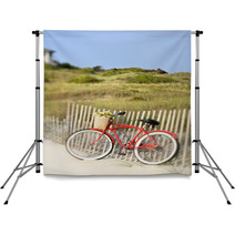 Bike Leaning Against Fence At Beach. Backdrops 2984949