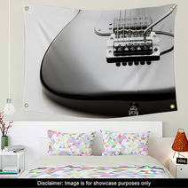 Black Electric Guitar Close Up On A White Background Wall Art 122303894