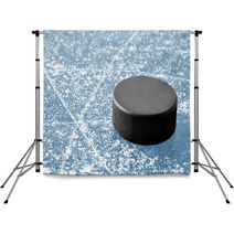 Black Hockey Puck On Ice Rink Backdrops 51737696