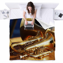 Blowing Brass Wind Instrument On Table Blankets 63942563