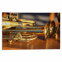 Blowing Brass Wind Instrument On Table Rugs 63942549