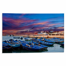Blue Fishing Boats On An Ocean Coast In Essaouira, Morocco Rugs 53975891