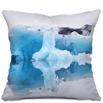 Blue Iceberg Symmetrically Reflected In The Water Pillows 66186871