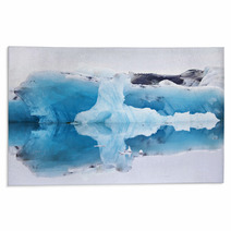 Blue Iceberg Symmetrically Reflected In The Water Rugs 66186871