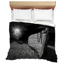 Boat On Beach Lit By The Beam Of Lighthouse Bedding 43176490