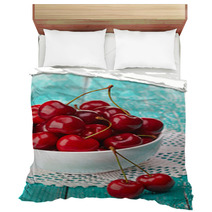 Bowl Of Fresh Red Cherries On Blue Wooden Background Bedding 54075358