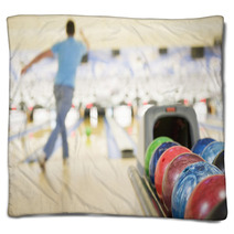 Bowling Ball Machine With Man Bowling In The Background Blankets 8093154