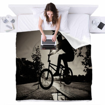 Boy Jumping Over Bench  On Bmx Blankets 33606175