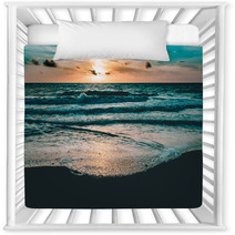 Bright Sun Rising In The Colorful Sky Over Dark Sand And Waves Nursery Decor 176183048