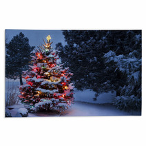 Brightly Lit Snow Covered Holiday Christmas Tree Winter Storm Rugs 54236814