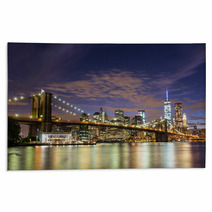 Brooklyn Bridge And Downtown Skyscrapers In New York At Dusk Rugs 70432328