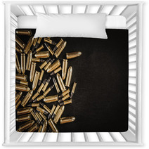 Bullets From The Gun Placed On A Black Wooden Table Nursery Decor 130223035