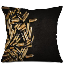 Bullets From The Gun Placed On A Black Wooden Table Pillows 130223035