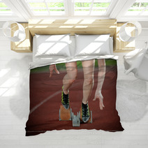 Close-up Image Of A Female Runner Leaving The Starting Blocks Bedding 46138963