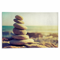 Concept Of Balance And Harmony Rocks On The Coast Of The Sea Rugs 55578965