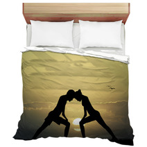 Couple Doing Yoga At Sunset Bedding 67438412