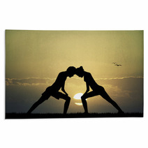 Couple Doing Yoga At Sunset Rugs 67438412