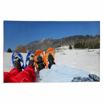 Couple With Blue And Orange Snowshoes In The Mountains Rugs 80386691