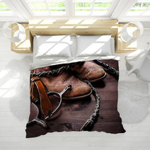 Cowboy Boots,whip And Spurs On Wood Bedding 38856298