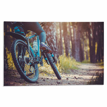 Cyclist Riding Mountain Bike In The Forest Rugs 111837211