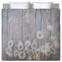 Dandelion Flowers On Wood Bedding 84544830