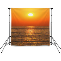 Deep Orange Color Sunset On The Beach Backdrops 66569659