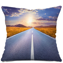 Driving On An Empty Road Towards The Setting Sun Pillows 57332138